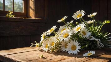 Bouquet of white daisies with bright yellow centres resting on a rustic wooden table photo