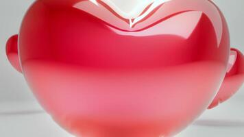 un rojo corazón conformado vaso escultura en un blanco superficie video