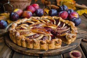 Homemade plum pie. Autumn plum pie. photo