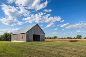 Modern agricultural barn with a yard of concrete slabs. photo