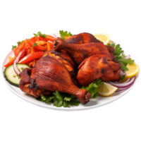 Tasty tandoori chicken plate with vegetable and lime slices on transparent background png