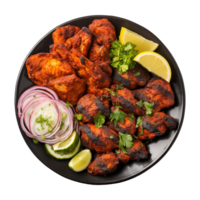 Tasty tandoori chicken plate with vegetable and lime slices on transparent background png