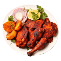 Tasty tandoori chicken plate with vegetable and lime slices on transparent background png