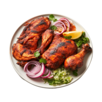 Tasty tandoori chicken plate with vegetable and lime slices on transparent background png