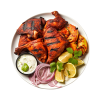 Tasty tandoori chicken plate with vegetable and lime slices on transparent background png