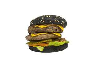 Fresh burger with meat and black bun isolated photo