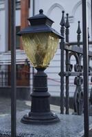 Street lantern on the background of building photo