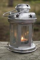 Vintage lantern with candle. Beautiful candle light. photo