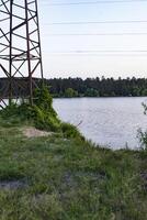 Electricity pylons in the landscape. photo