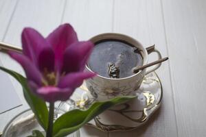 Coffee and flower close up. photo