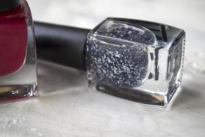 Nail polish on a table. photo