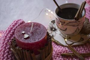 A cup of coffee with cinnamon. Home decor. Cozy still life. photo