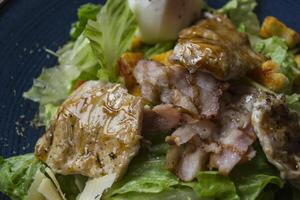 Caesar salad with chicken. photo