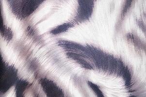 A zebra print fabric with a white background photo