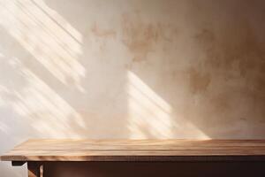 Empty wooden table top near stucco wall with with sunlight falling from the window and shadows. Table top with copy space for product advertising photo