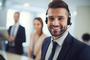 Portrait of a call center worker accompanied by his team. Smiling customer service operator at work. photo