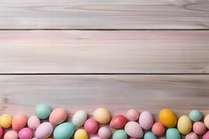 Easter holiday celebration banner greeting card with pastel painted eggs on bright wooden tabel texture photo