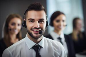 Portrait of a call center worker accompanied by his team. Smiling customer service operator at work. photo