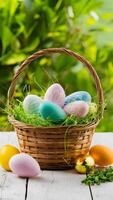 Easter basket with painted eggs and decorations on white table Vertical Mobile Wallpaper photo