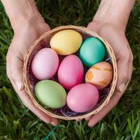 Close up hands hold basket filled with colorful Easter eggs For Social Media Post Size photo