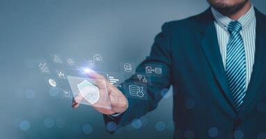 Concept artificial intelligence Data analysis business analytics internet technology. Businessman hand touch on virtual screen KPI Dashboard.analyzing financial graph, economic graph growth chart. photo