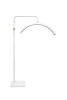 Modern LED floor lamp in the shape of a crescent. Lamp for minimalist interiors. Isolate on a white back photo