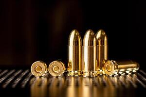 Pistol cartridges 9 mm. Ammunition for pistols and PCC carbines on a dark background. photo