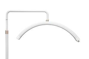 Modern LED floor lamp in the shape of a crescent. Lamp for minimalist interiors. Isolate on a white back photo