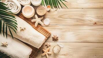 Relaxation spa banner with towels, candles for wellness, retreat and zen themes on wooden backdrop photo