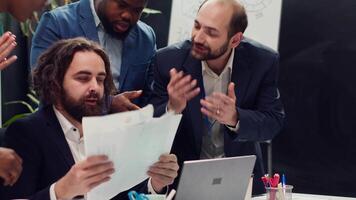 Sick and tired employee throwing the badge in front of the manager, exhausted working under pressure for his mad supervisor. Angry worker quitting his job during a meeting, leaving office. Camera A. video