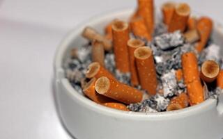 Full ashtray of cigarettes close up macro view smoking habits hi-res stock photography and images high quality big size instant download photo