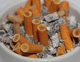 Full ashtray of cigarettes close up macro view smoking habits hi-res stock photography and images high quality big size instant download photo