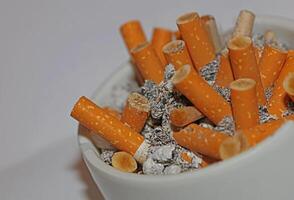 Full ashtray of cigarettes close up macro view smoking habits hi-res stock photography and images high quality big size instant download photo