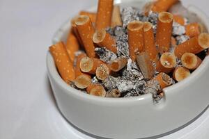 Full ashtray of cigarettes close up macro view smoking habits hi-res stock photography and images high quality big size instant download photo