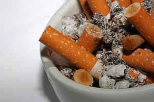 Full ashtray of cigarettes close up macro view smoking habits hi-res stock photography and images high quality big size instant download photo