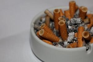 Full ashtray of cigarettes close up macro view smoking habits hi-res stock photography and images high quality big size instant download photo