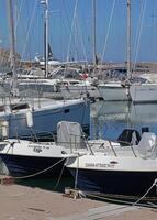 Rethimno, Greece, Friday 15 March 2024 Crete island holidays exploring the city port riviera luxury yachts close up summer background carnival season high quality big size printings photo