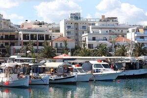 Rethimno, Greece, Friday 15 March 2024 Crete island holidays exploring the city port riviera luxury yachts close up summer background carnival season high quality big size printings photo