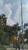 Prambanan temple courtyard with trees in Indonesia photo