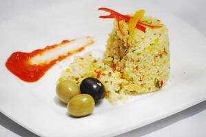 Risotto with Olives on the Side. An Italian Favourite. photo