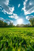 Sun Shining Through Clouds Over Green Field photo