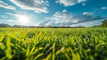 Sun Shining Through Clouds Over Green Field photo