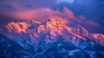 Snow Covered Mountain Range Under Cloudy Sky photo