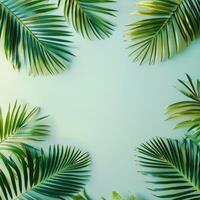 Vibrant Green Palm Leaves on Blue Background photo