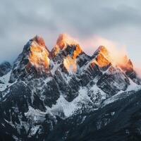 Snow-Covered Mountain With Clouds photo