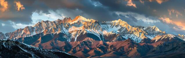 Majestic Mountain Range With Clouds photo