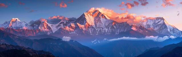 Mountain Range Silhouetted Against Sunset photo