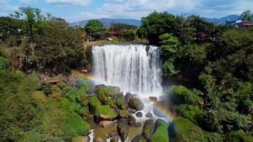 Elephant Waterfall And Da Lat City Houses in Lam Dong Province, Vietnam - Aerial static video