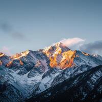 Snow Covered Mountain Against Sky photo