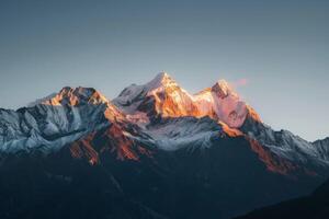 Majestic Snow Covered Mountain Against Sky photo